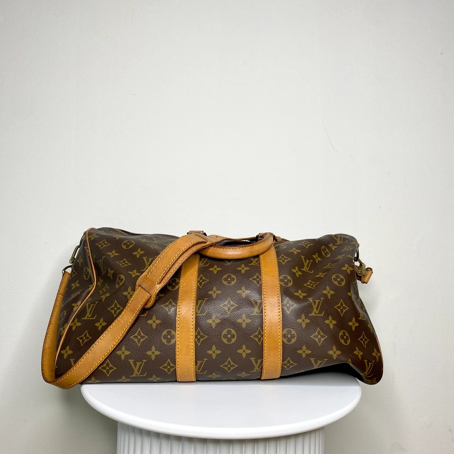Louis Vuitton Keepall 45 Bandoulière + naamtag en slotje