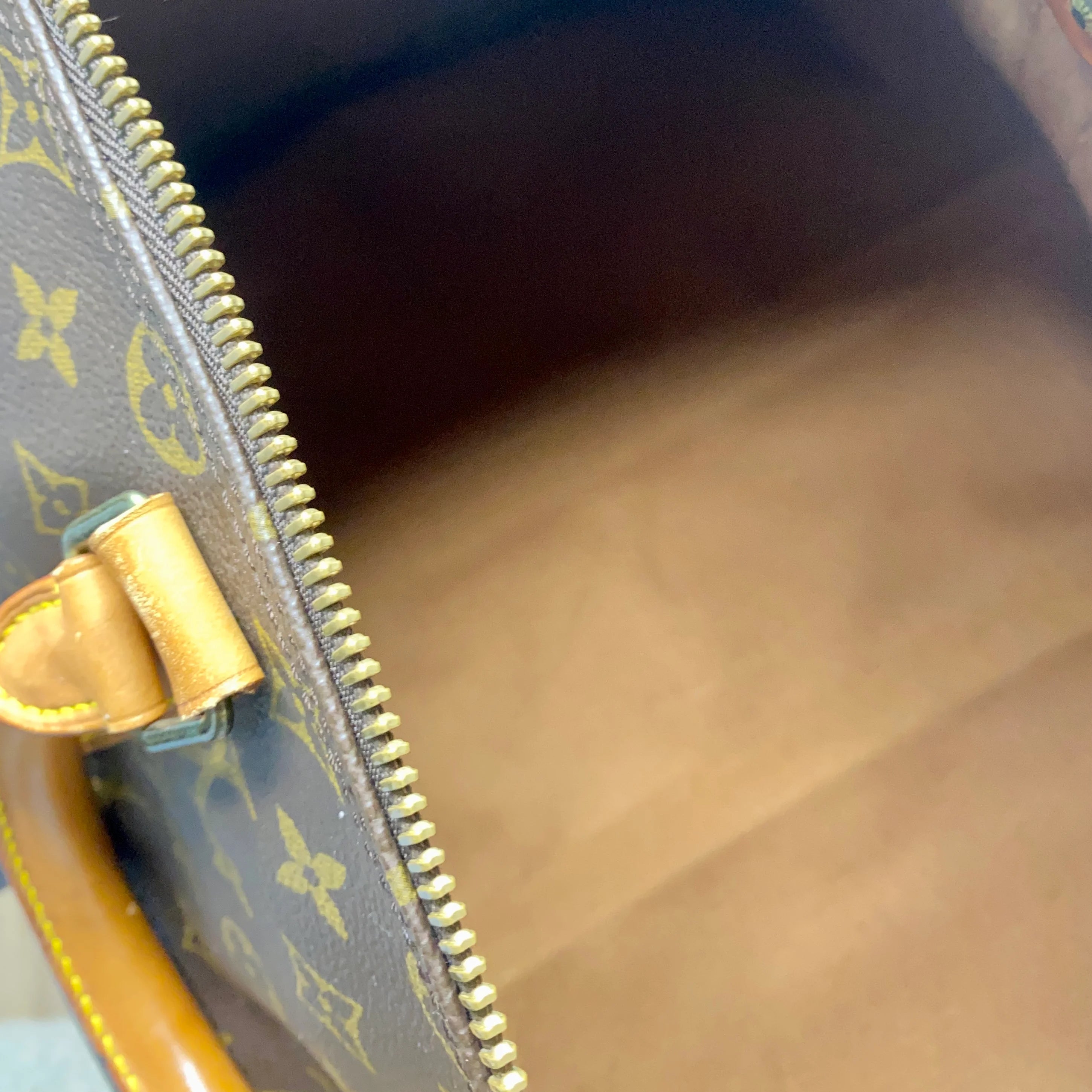 Louis Vuitton Keepall 45 Bandoulière + naamtag en slotje