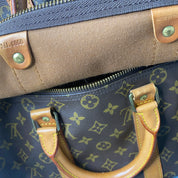 Louis Vuitton Keepall 45 Bandoulière + naamtag en slotje