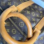 Louis Vuitton Keepall 45 Bandoulière + naamtag en slotje