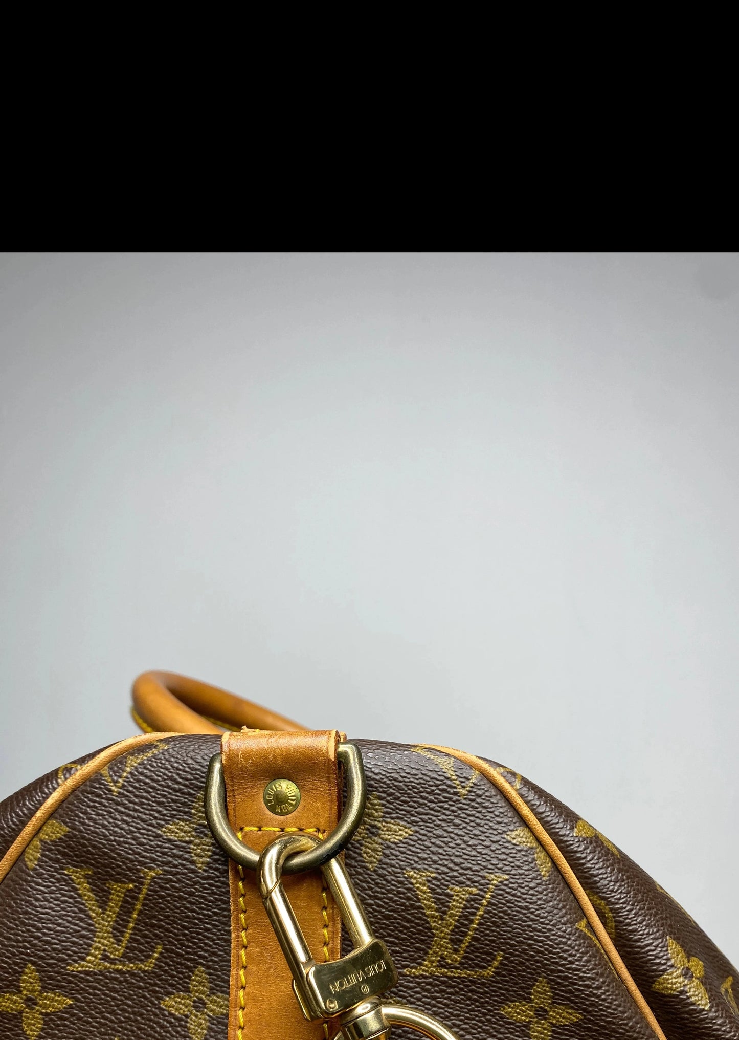 Louis Vuitton Keepall 45 Bandoulière + naamtag en slotje