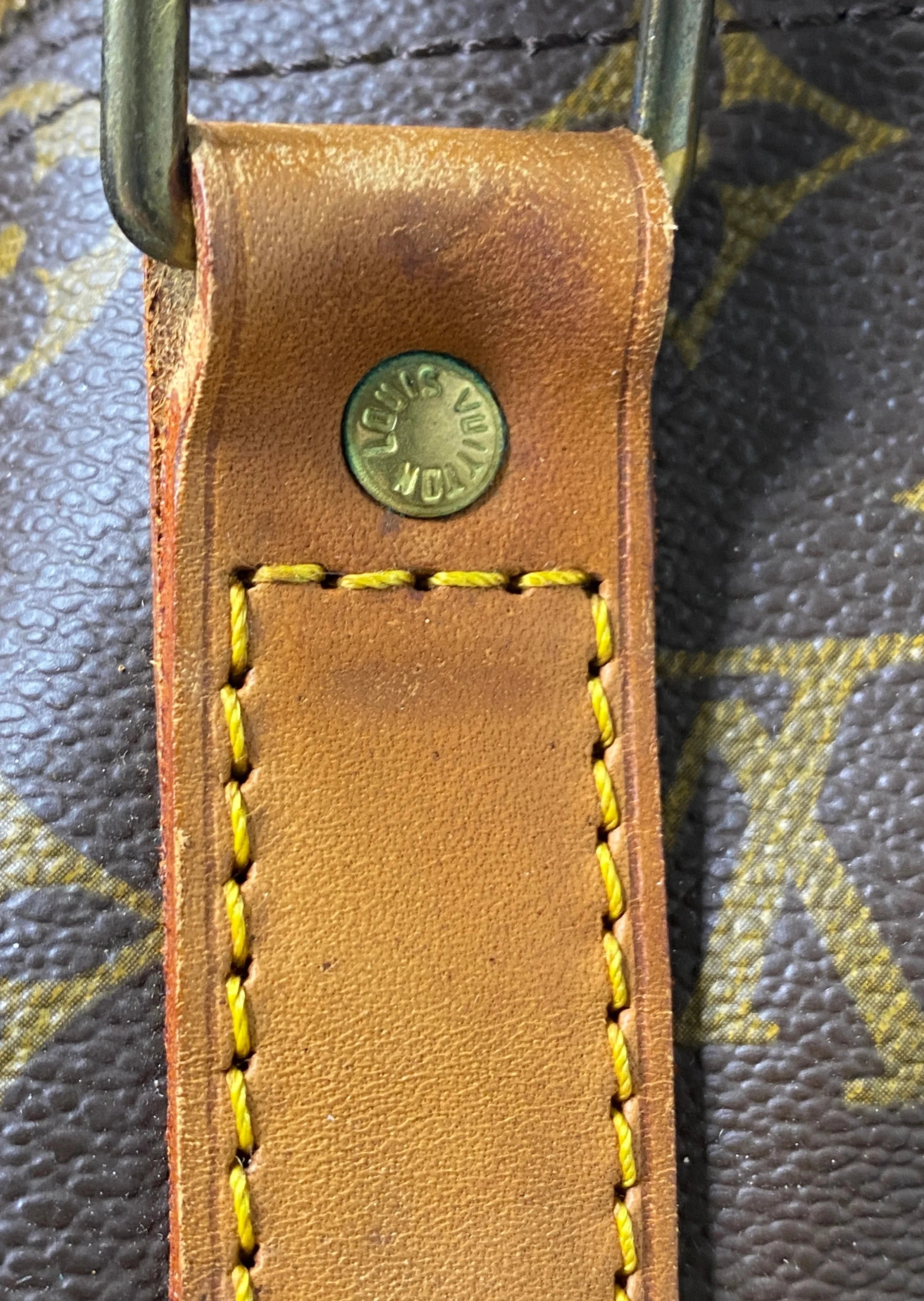 Louis Vuitton Keepall 45 Bandoulière + naamtag en slotje