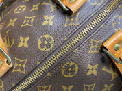 Louis Vuitton Keepall 45 Bandoulière + naamtag en slotje