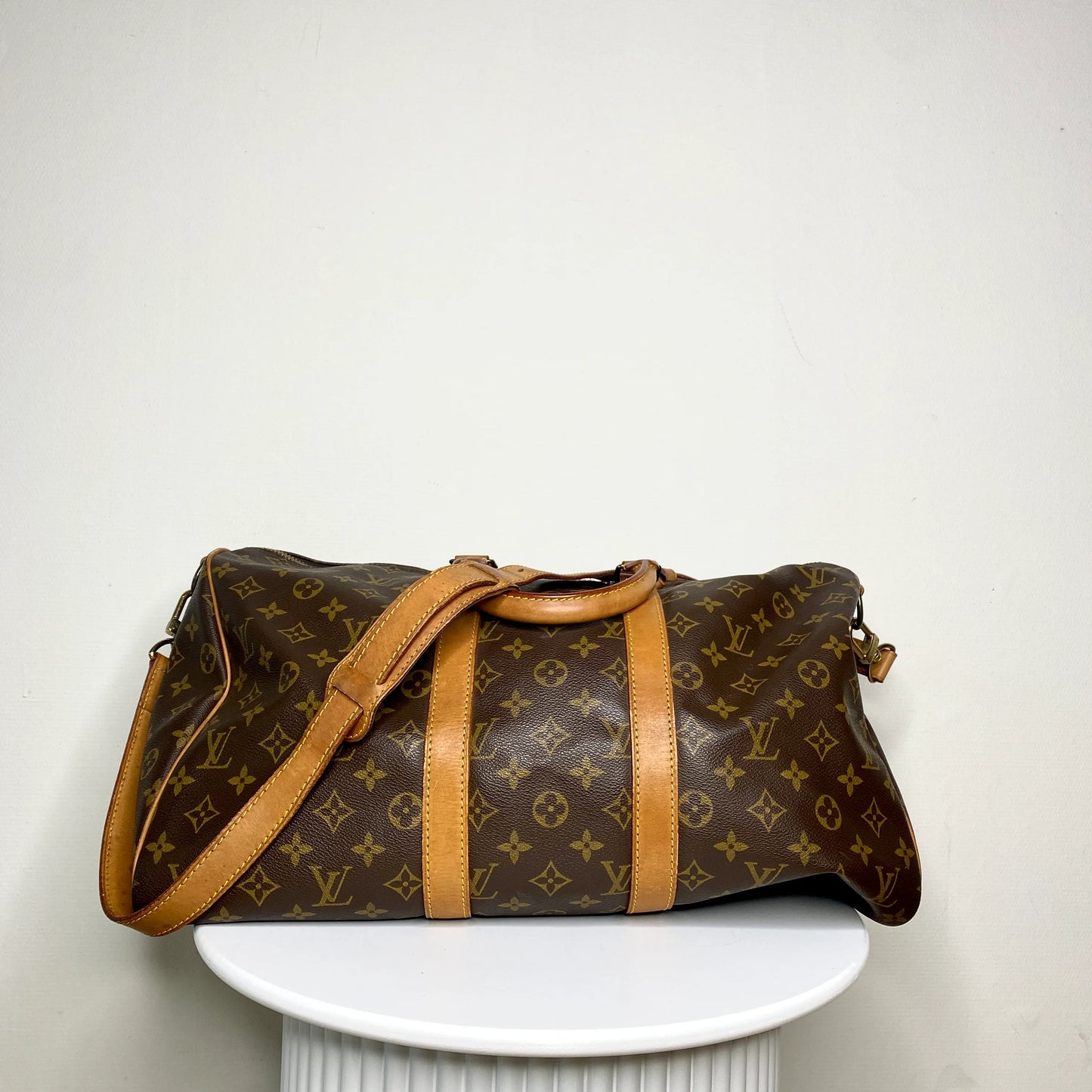 Louis Vuitton Keepall 45 Bandoulière + naamtag en slotje
