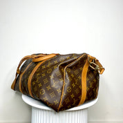 Louis Vuitton Keepall 45 Bandoulière + naamtag en slotje
