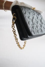LOUIS VUITTON Pochette Cousin