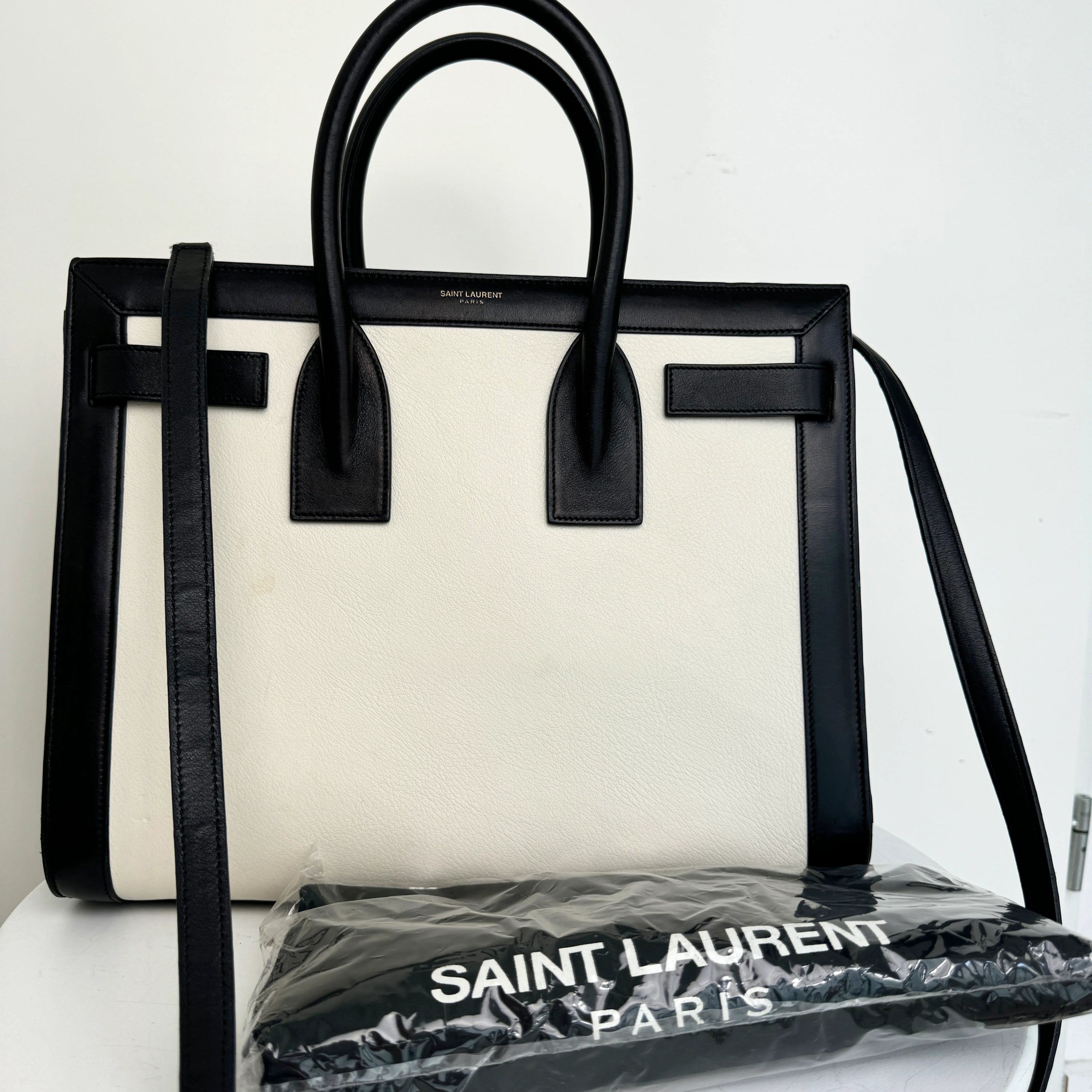 SaintLaurentSacdeJourBlackWhitemetdustbag.webp